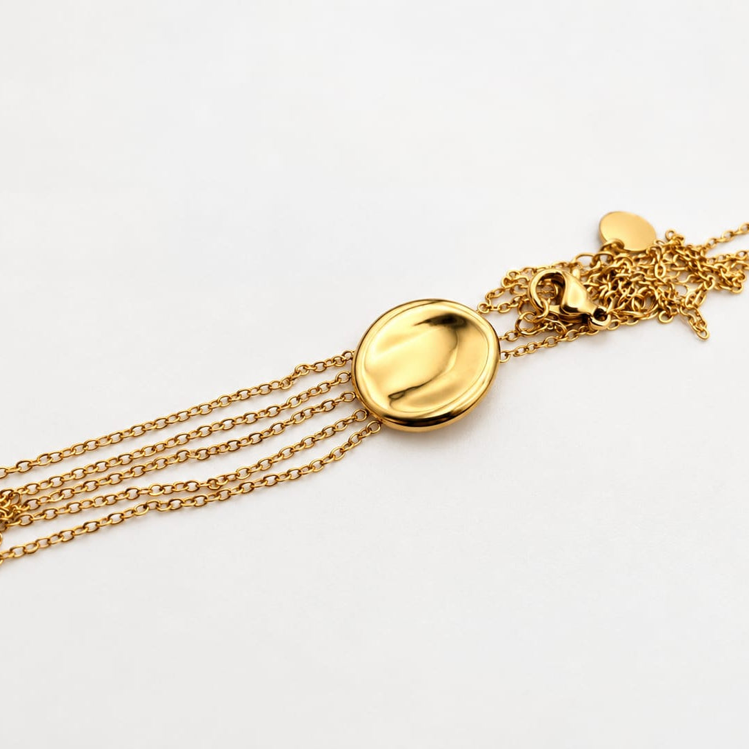 CASCADE – Collier Médaillon & Franges Dorées