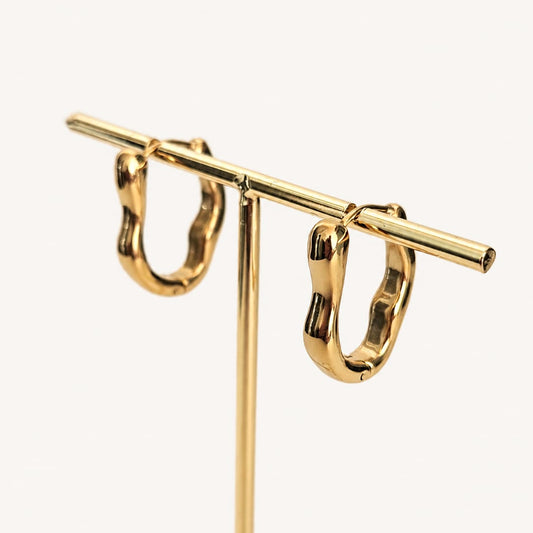 NÉLIA – Boucles d'oreilles créoles dorées ovales et ondulées