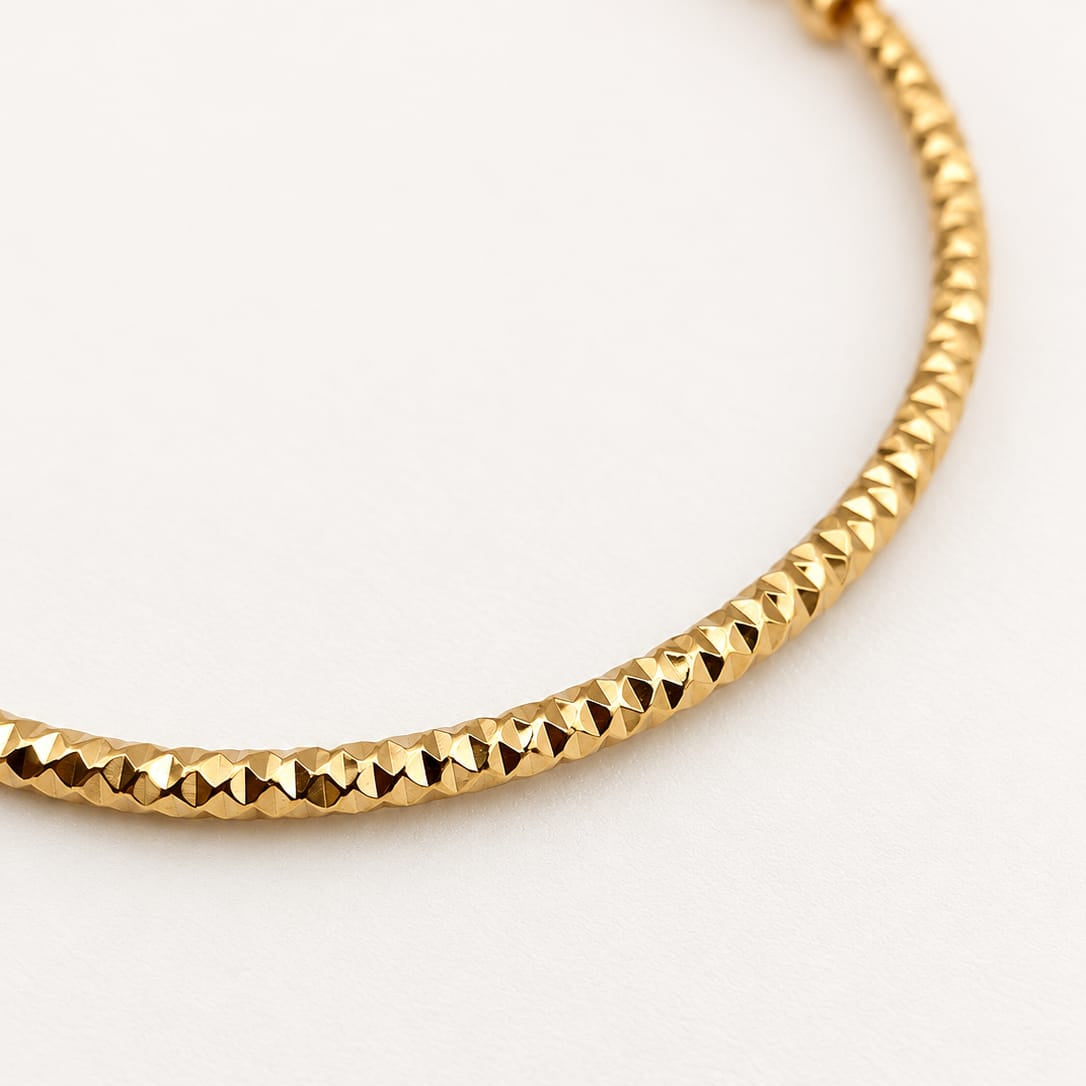 ALMA – Boucles d’oreilles créoles dorées facettées