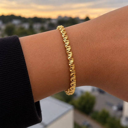 NAYA – Bracelet maillons dorés tressés